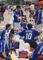 Japan supporters wait for opening of Japan-Belgium match